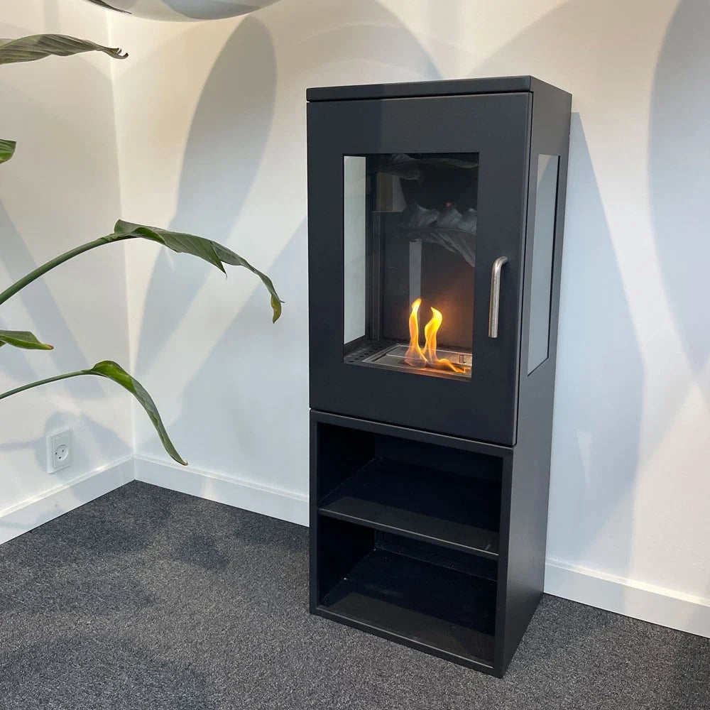 Cheyenne bioethanol stove fireplace in a room corner, lit flame, showing the 3-sided glass view